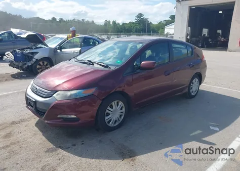 2011 Honda Insight from USA, damaged, VIN JHMZE2H37BS012364